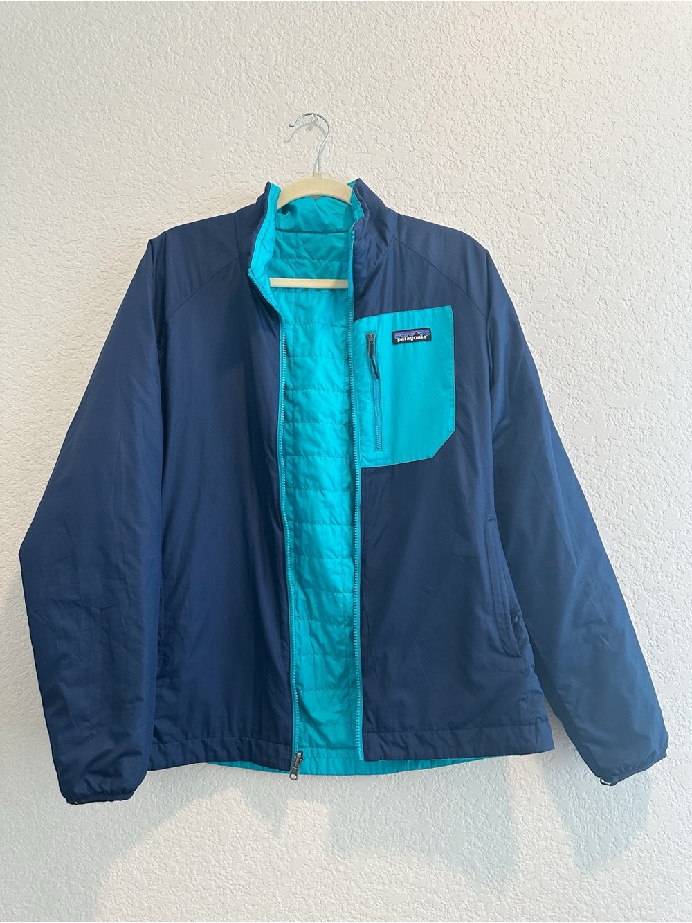 Patagonia Reversible Nanopuff Snowbelle Navy Jacket with Teal Chest Panel